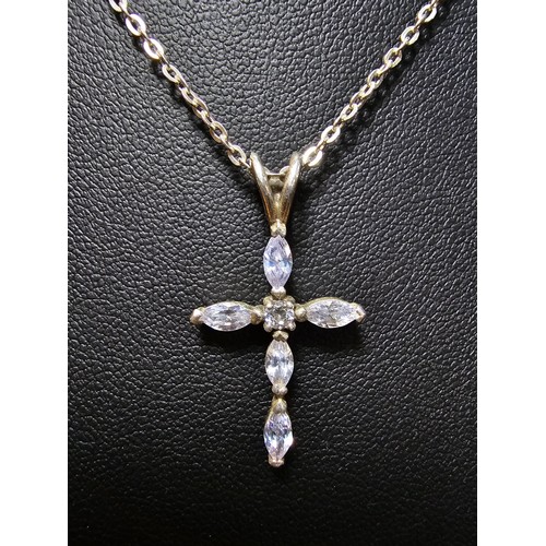 217 - A pretty 925 silver cross pendant inset with genuine iolite gemstones set on an 18