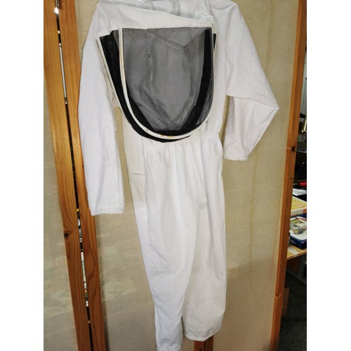 129 - Bee Keepers child's size all in one body suit in good order size 10