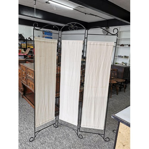 130 - 3x division cream fabric coloured metal screen.with scroll design stands at 177cm high each division... 