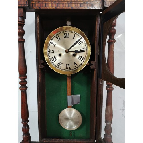 134 - A good quality vintage Vienna wall clock, with detailed inlay to the front and carved acorn and leaf... 