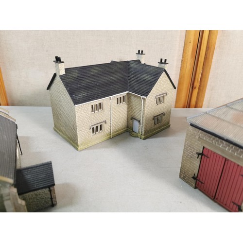 115 - 5x plastic well detailed properties for railway layouts inc a large town house, church, railway shed... 