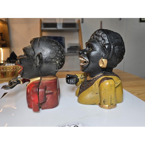 339 - A pair reproduction cast iron money boxes one is named Dinah, and Jolly, both are aged copies of the... 