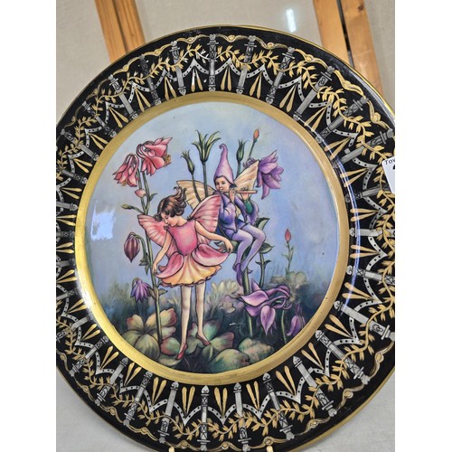 348 - Heavy large and impressive ironstone charger by Victoria ware which features an attractive a fairy a... 