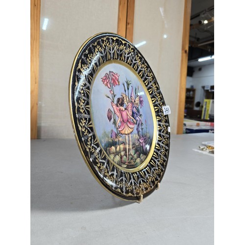 348 - Heavy large and impressive ironstone charger by Victoria ware which features an attractive a fairy a... 