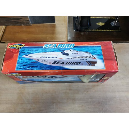 350 - Boxed Fast Lane RC sea bird boat in working order complete with remote control