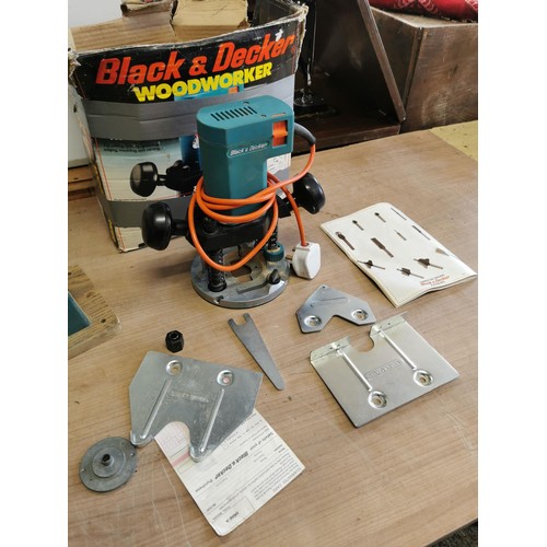 371 - A boxed Black & Decker router along with a mitre saw.