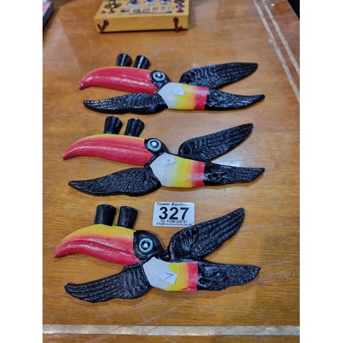 327 - 3x cast iron graduated wall hanging Guinness Toucans in excellent condition largest measures 26cm lo... 