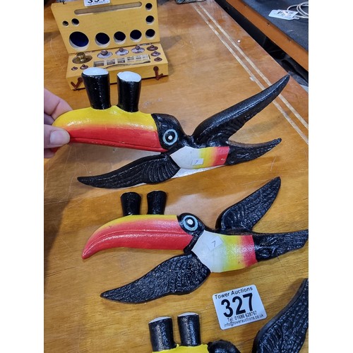 327 - 3x cast iron graduated wall hanging Guinness Toucans in excellent condition largest measures 26cm lo... 