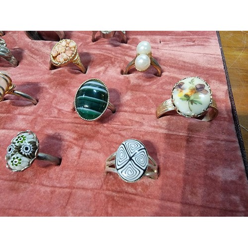 328 - A collection of 16x ornate dress rings rings feature semi precious stones, art glass deigns etc disp... 