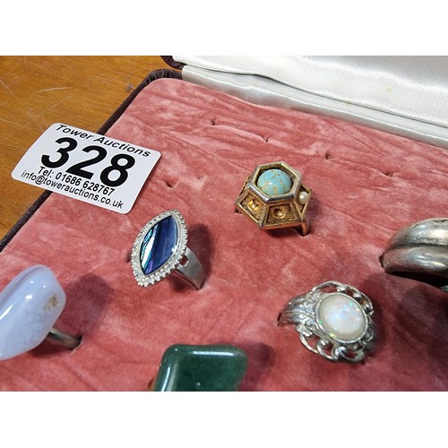 328 - A collection of 16x ornate dress rings rings feature semi precious stones, art glass deigns etc disp... 