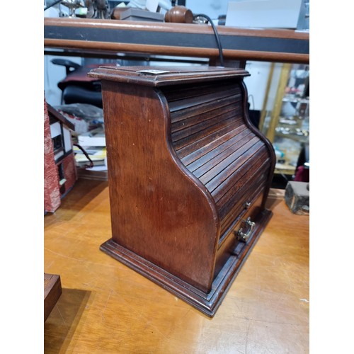 333 - Nice quality antique table top roll top desk in solid mahogany  the roll top is in good order and fu... 