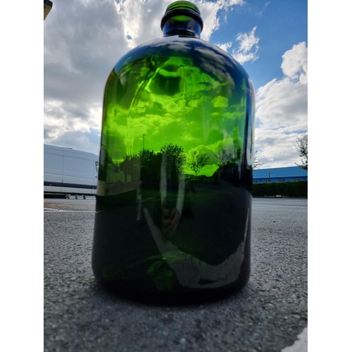 338 - Vary large and impressive green glass demi-john style bottle this bottle is 54cm high and diameter 2... 