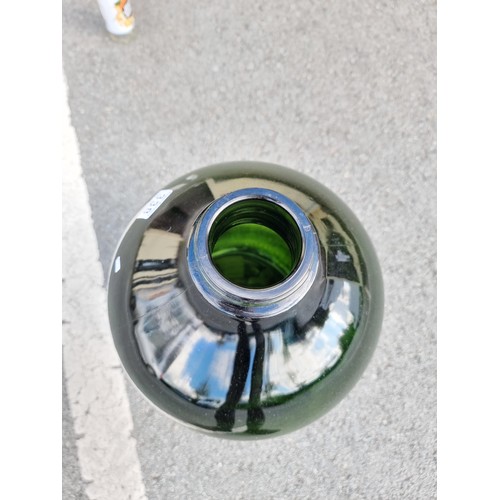 338 - Vary large and impressive green glass demi-john style bottle this bottle is 54cm high and diameter 2... 