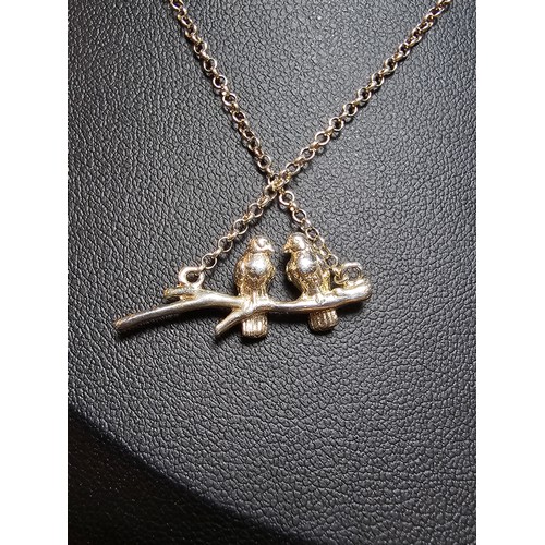 229 - Pretty 925 silver necklace with a pair of love birds pendant set on a 18