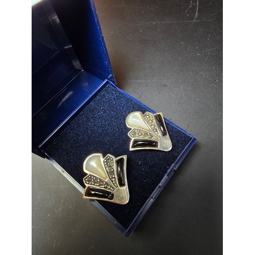 232 - Pair of as new unused 925 silver Art deco style earrings in the classical fan design inset with marc... 