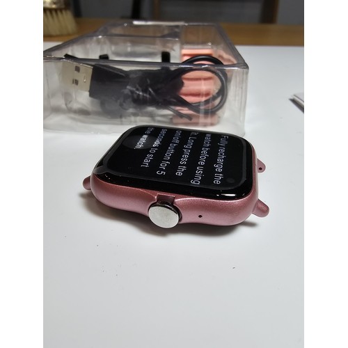 270 - A brand new smart watch in pink. Will measure your sleep, heart rate, exercises, etc.