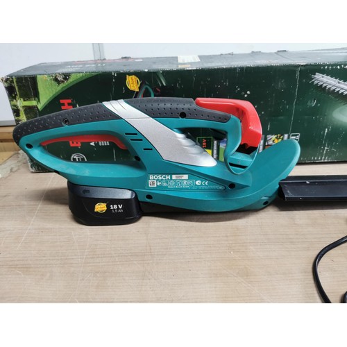 393 - A boxed Bosch AHS 52 L1 cordless hedge strimmer, complete with battery and charger