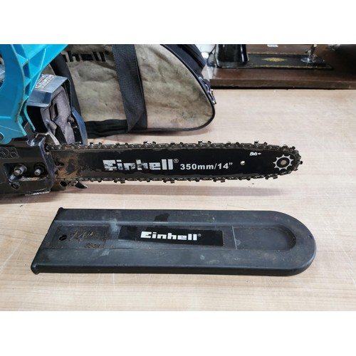 394 - Einhell petrol chainsaw in working order complete with carry case, chainsaw powers  and cuts but iss... 