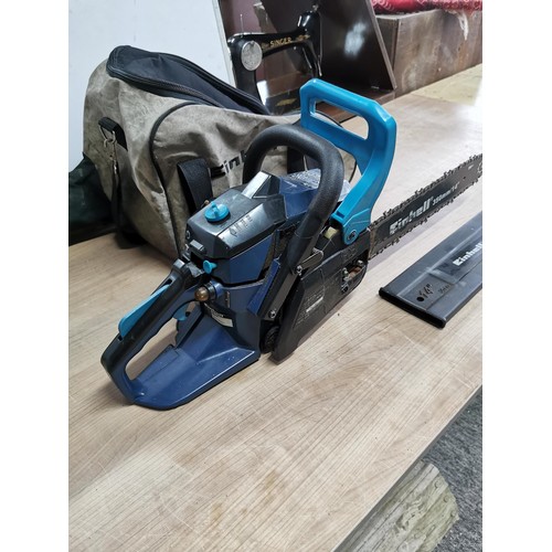 394 - Einhell petrol chainsaw in working order complete with carry case, chainsaw powers  and cuts but iss... 