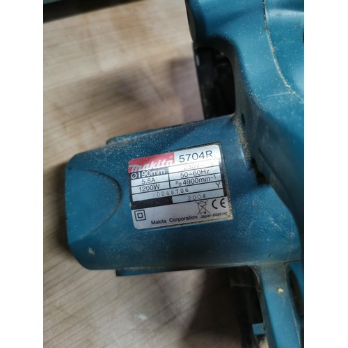 399 - A Makita PAT tested steel saw 570 4R complete with case