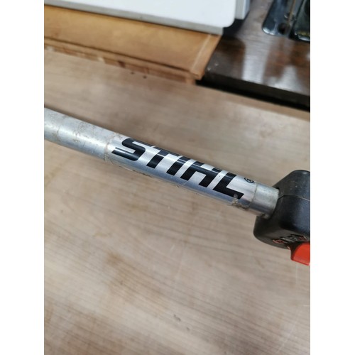 404 - A Stihl FS 52 garden strimmer with protective guard, has compression.