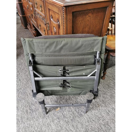 415 - A good quality Total Fishing Gear fishing chair, padded in good order, folds down flat has adjustabl... 