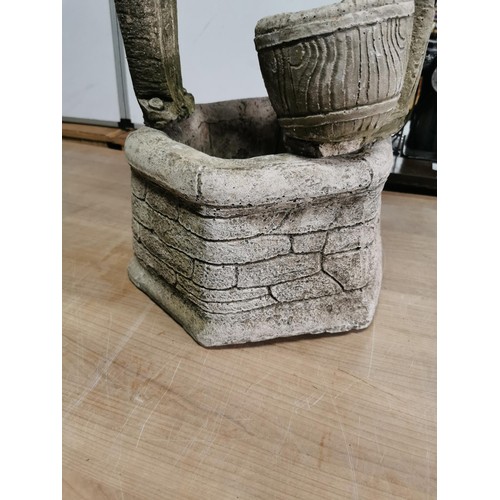 417 - Good quality well detailed wishing well formed concrete planter in good order roof and stand come of... 