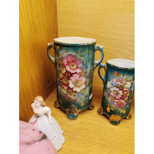 148 - Shelf full of collectables inc 2x barley twist candle holders, 2x coalport figurines, pink swirl des... 