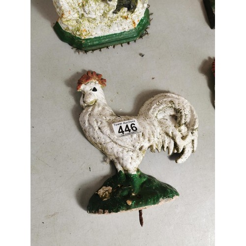 446 - 4x cast iron door stops to include 2x chicken formed door stops, Cockerell door stop and a Border Co... 