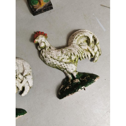 446 - 4x cast iron door stops to include 2x chicken formed door stops, Cockerell door stop and a Border Co... 