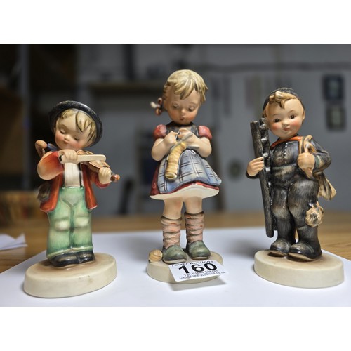 160 - 3 good vintage Goebel M.J.Hummel figures which includes a chimney sweep figure, a girl doing needlew... 