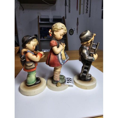 160 - 3 good vintage Goebel M.J.Hummel figures which includes a chimney sweep figure, a girl doing needlew... 