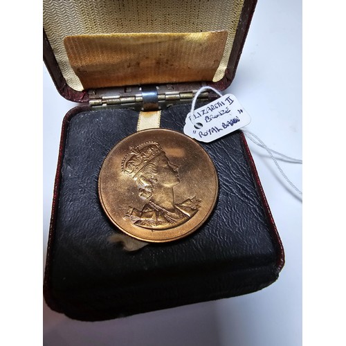 165 - A vintage 1953 copper Coronation medallion for Queen Elizabeth II dated June 2nd 1953, complete with... 