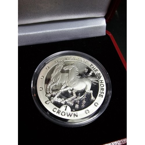 166 - A Pobjoy mint year of the horse silver proof £1 coin for the Isle of man 2002 struck in 999.9 silver... 