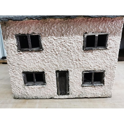 424 - Large Stoneware model house in pink with pebble dash exterior and wooden window frame and door in go... 