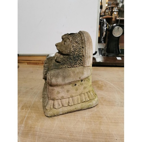 433 - Small stoneware well detailed garden ornament of a hedgehog sitting on a arm chair in good order sta... 