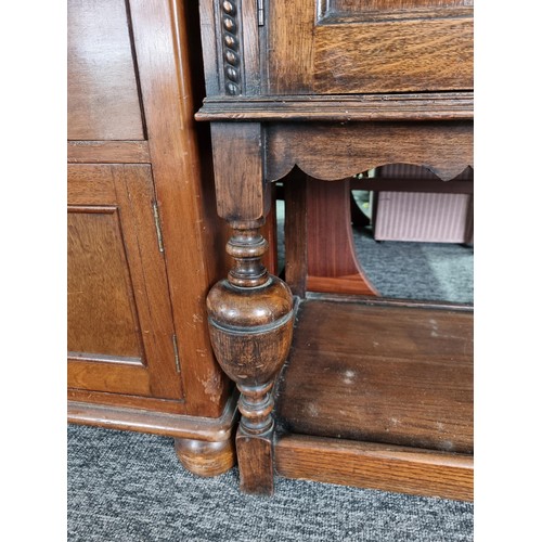 486 - A good quality solid oak antique ornate sideboard with two doors to the side and two drawers to the ... 