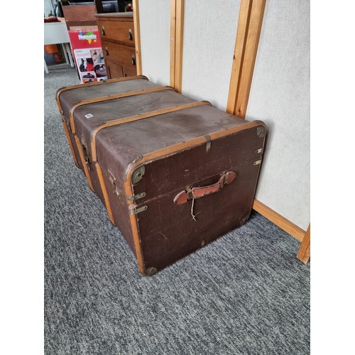 488 - Large wood bound travellers trunk in good order stamped C.R. to the top in good overall condition wi... 