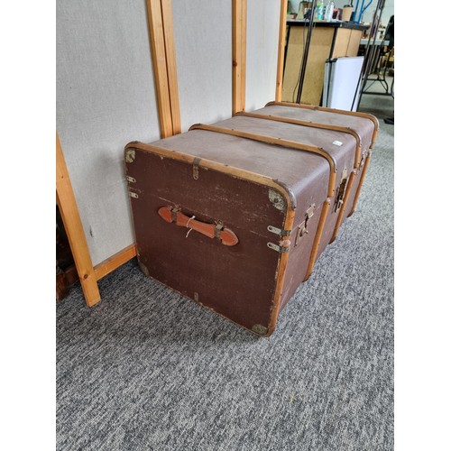 488 - Large wood bound travellers trunk in good order stamped C.R. to the top in good overall condition wi... 