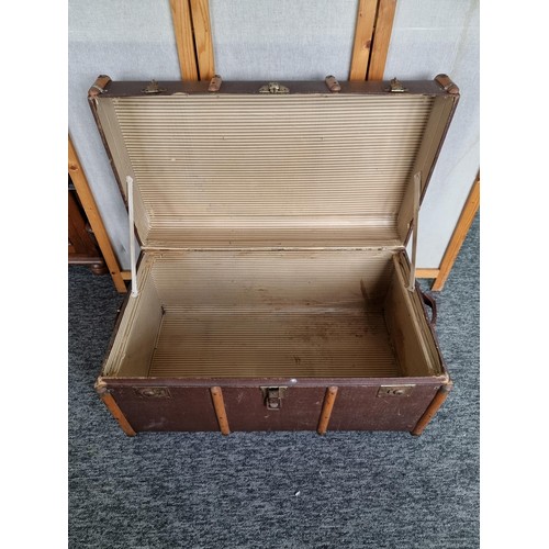 488 - Large wood bound travellers trunk in good order stamped C.R. to the top in good overall condition wi... 