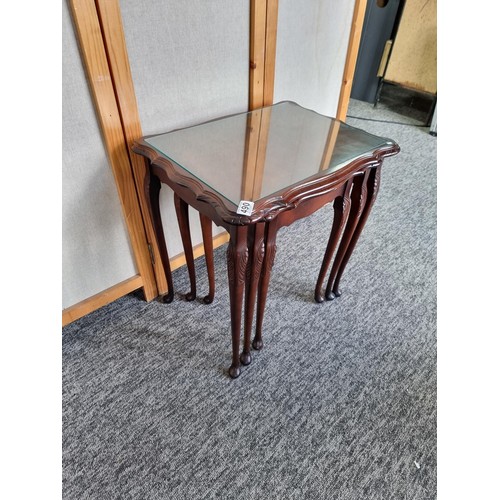 490 - Good quality nest of three tables in oak with glazed tops and flutted edges in good overall conditio... 