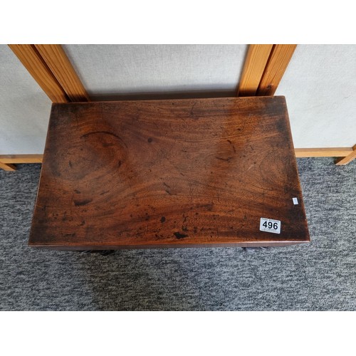 496 - A good quality Victorian mahogany occasional table with concealed bidet / babies bath inset, top lif... 