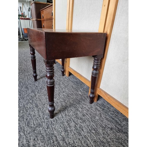 496 - A good quality Victorian mahogany occasional table with concealed bidet / babies bath inset, top lif... 