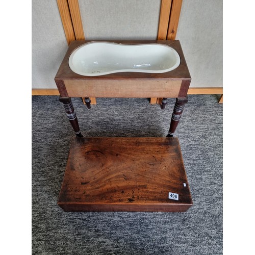 496 - A good quality Victorian mahogany occasional table with concealed bidet / babies bath inset, top lif... 