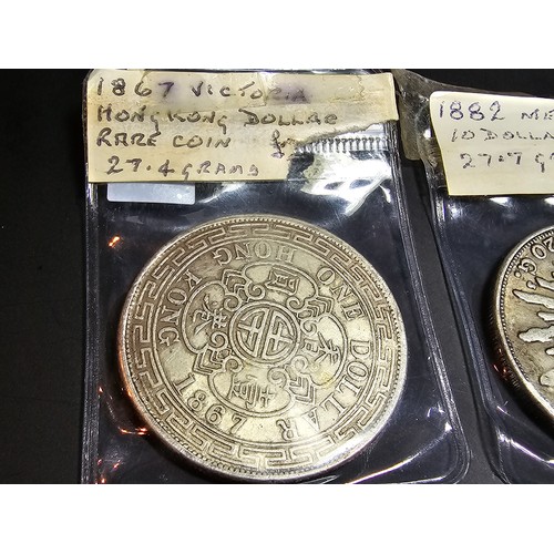 174 - A collection of 3 antique coins to include an 1882 Mexican 8 reales coin, a 1908 French Republic ind... 