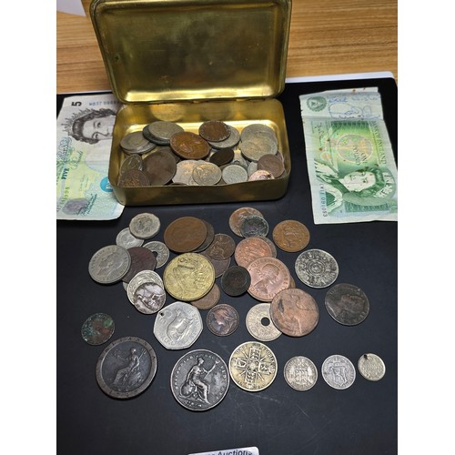 179 - An original WW1 brass Christmas tin from 1914 full of various British and world coins to include som... 