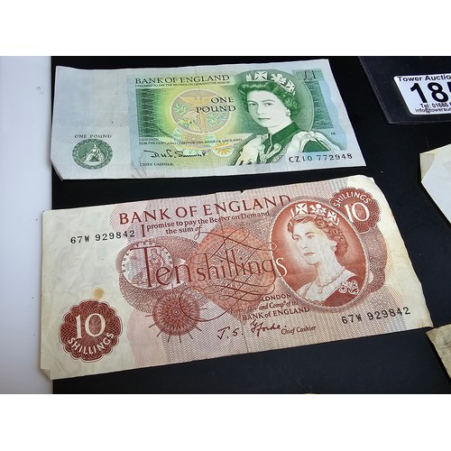 185 - A quantity of German wartime banknotes and coins along with 2 British £1 notes and a 10 shilling not... 