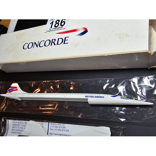 186 - A vintage boxed as new Concorde model aeroplane complete with its original box, the model has a leng... 