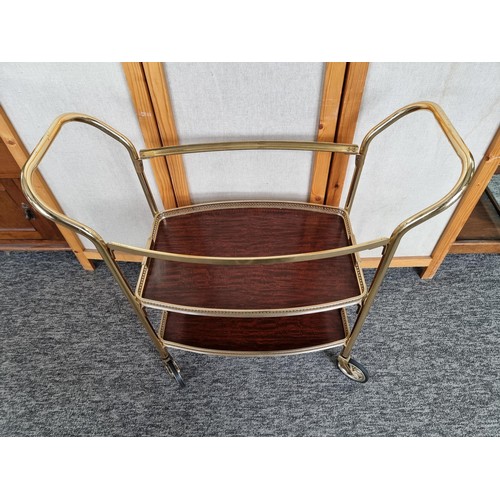 475 - Vintage brass hostess drinks / food trolley with removable top in good overall condition. Measures 7... 