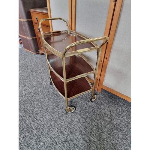 475 - Vintage brass hostess drinks / food trolley with removable top in good overall condition. Measures 7... 